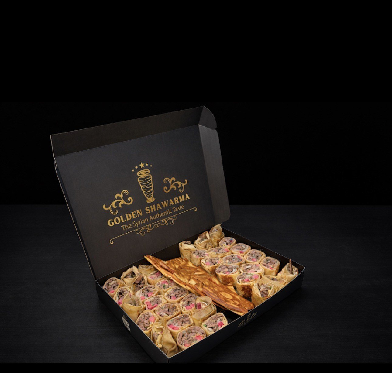 Golden Shawarma catering box packed with beef shawarma wraps for a party