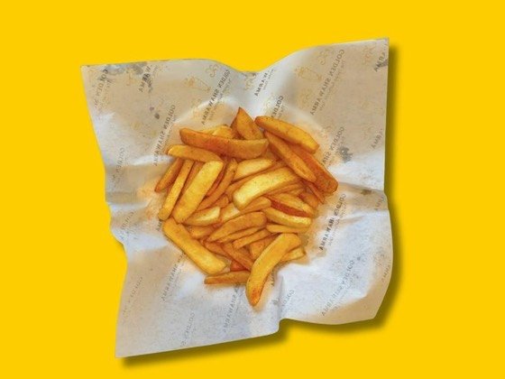 Golden french fries served hot