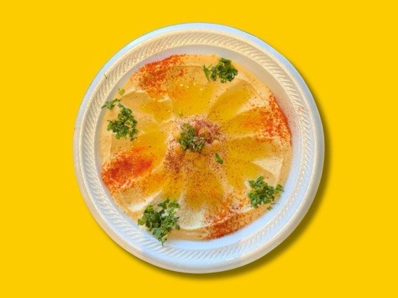 Hummus with olive oil, chickpeas and warm pita bread