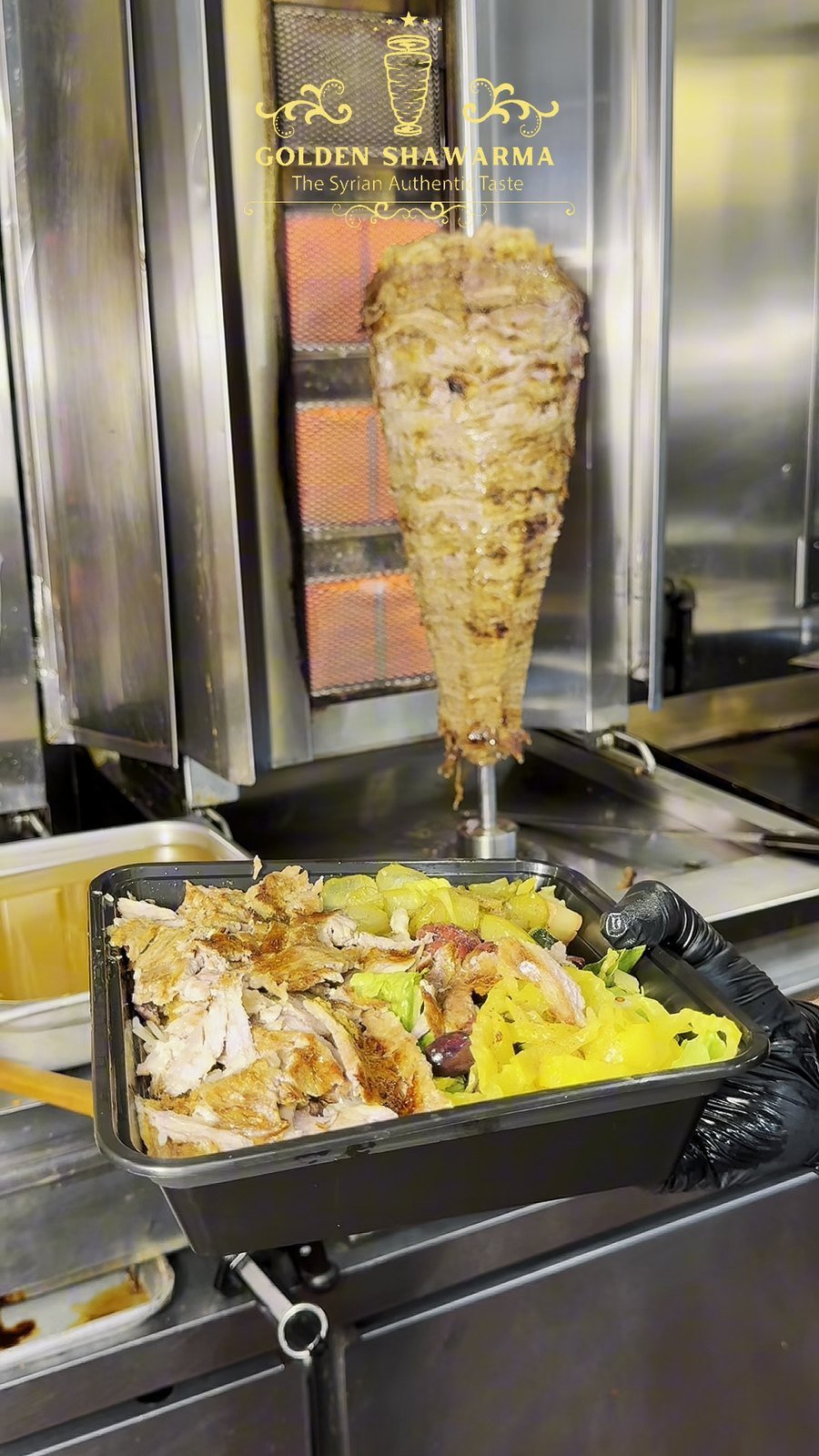 Catering tray being filled with beef shawarma at Golden Shawarma in Richardson