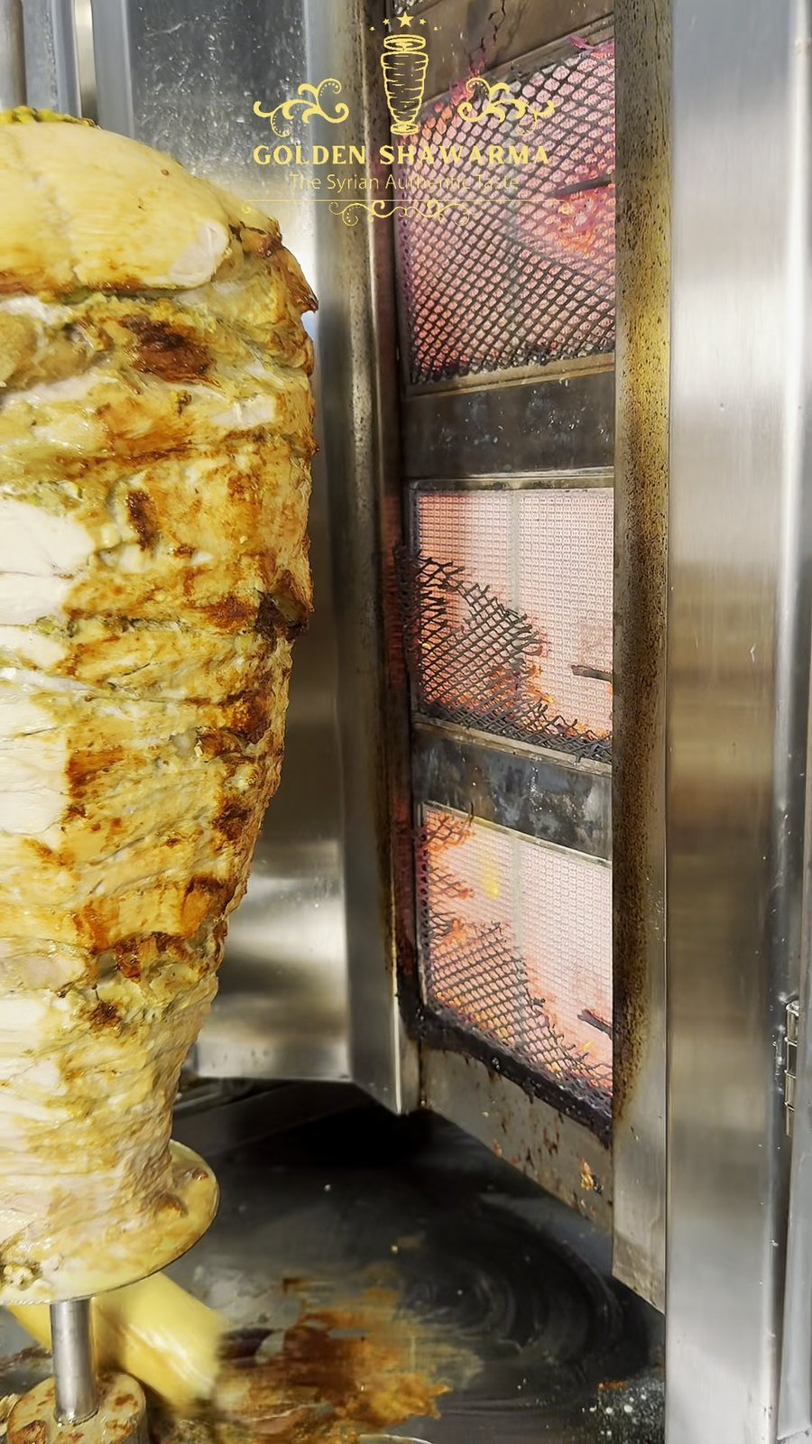 Chicken and beef shawarma turning on two vertical rotisseries side by side