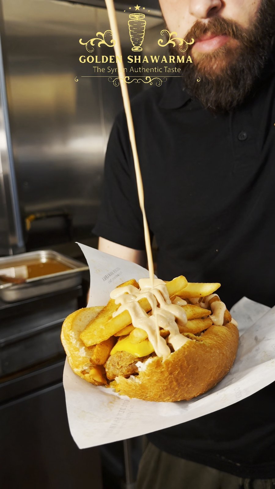 Chicken Zinger sandwich loaded with fries, American cheese and cocktail sauce